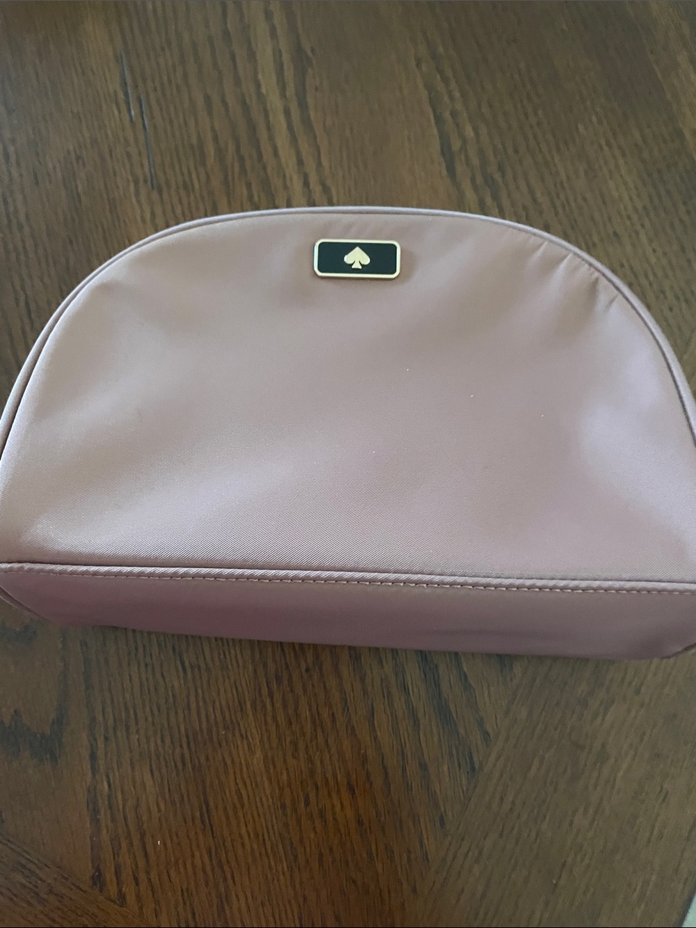 kate spade blush pink cosmetic pouch with gold spade emblem